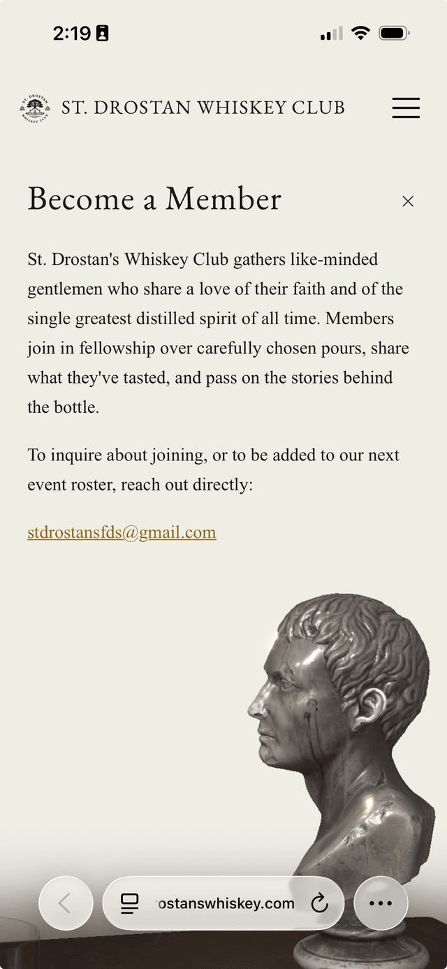 Saint Drostan Whiskey Club bust overlay on mobile